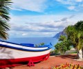 fishing boat on display near the ocean in Los Gigantes Tenerife 120x100