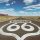 Highway sign for Route 66 on country road