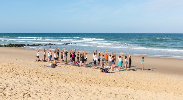 Lacanau, France. Yoga sur la plage iStock